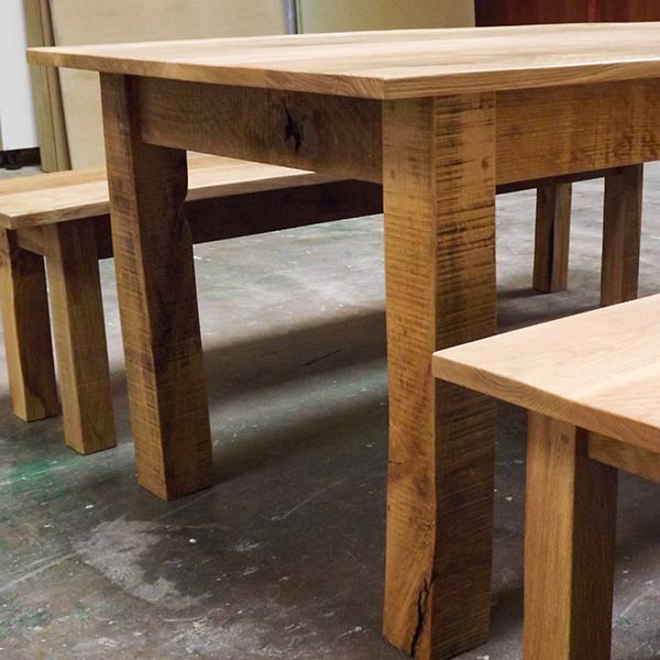 handmade wooden table with benches