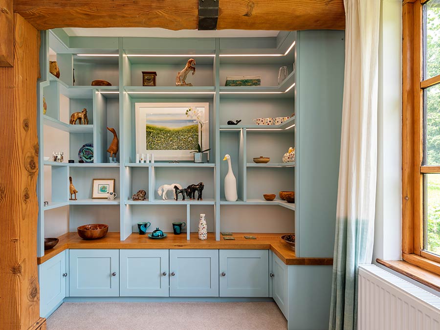 bespoke shelving with ornaments in a light blue colour