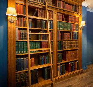 Bespoke library bookcase with integrated ladder on wheels