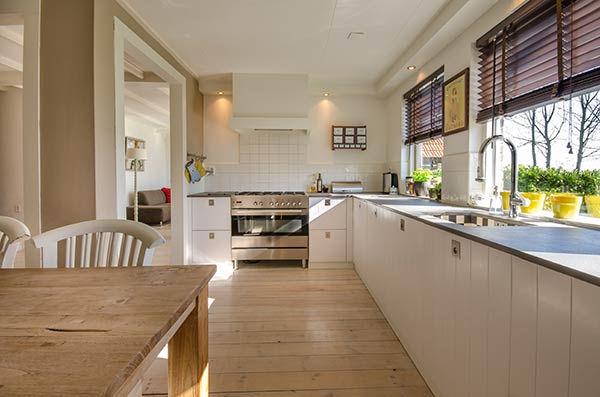 bespoke kitchen with wood flooring
